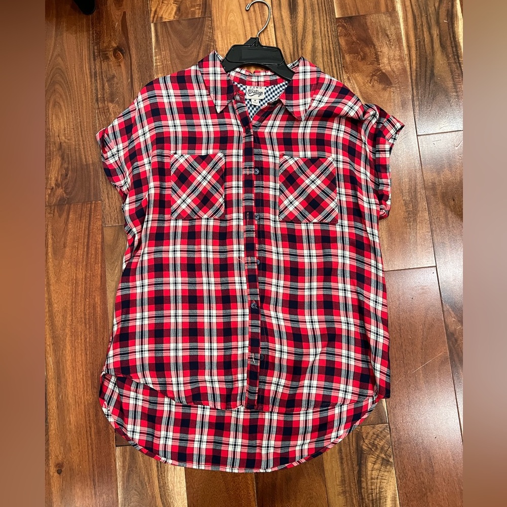 Button down short sleeve farmer girl shirt.